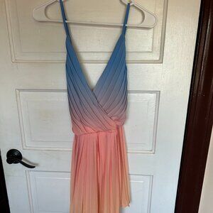 Flying Tomato Sunset Pleated Romper sold by lulus